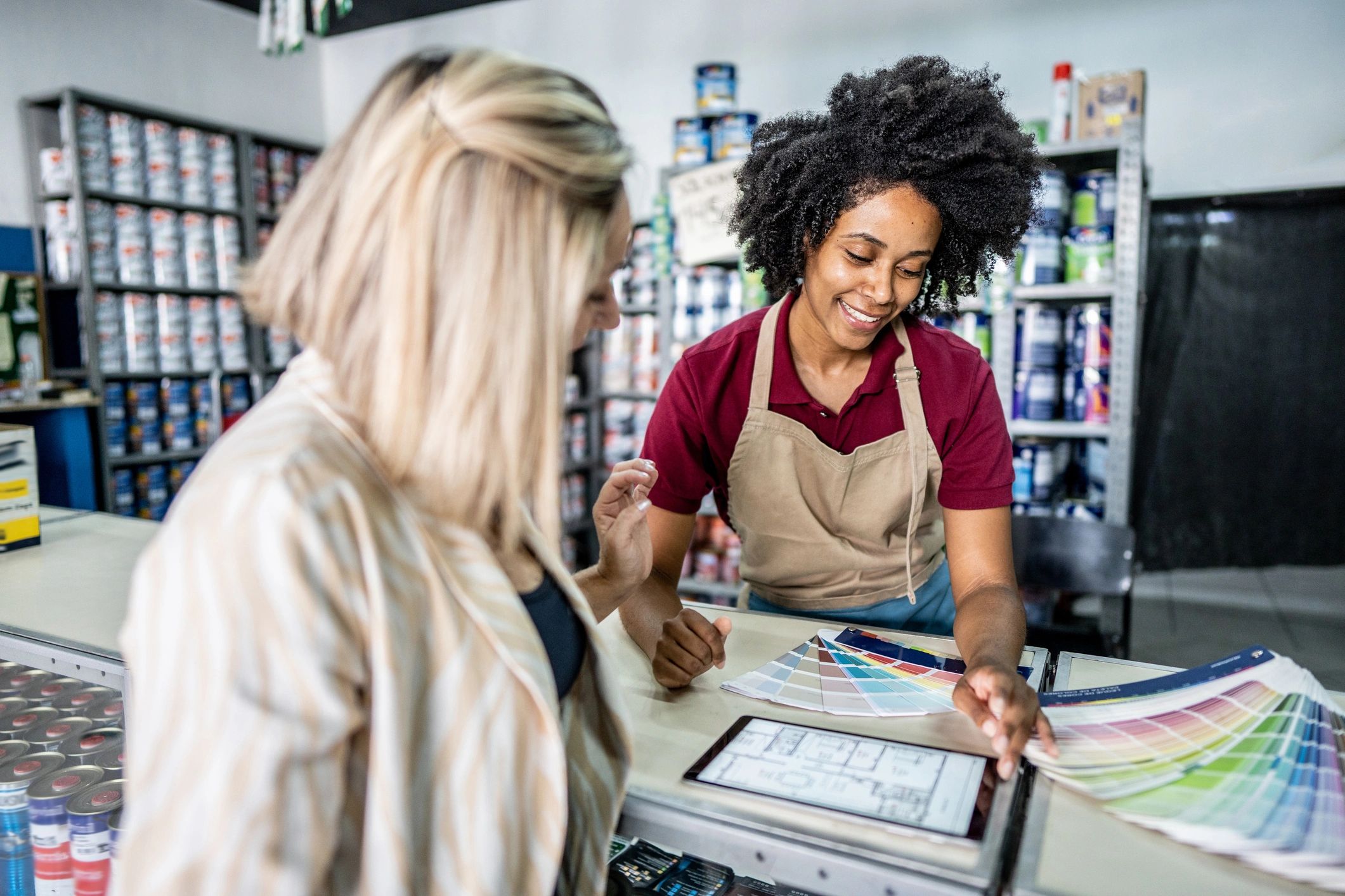 Customer service at a local counter helping with a package