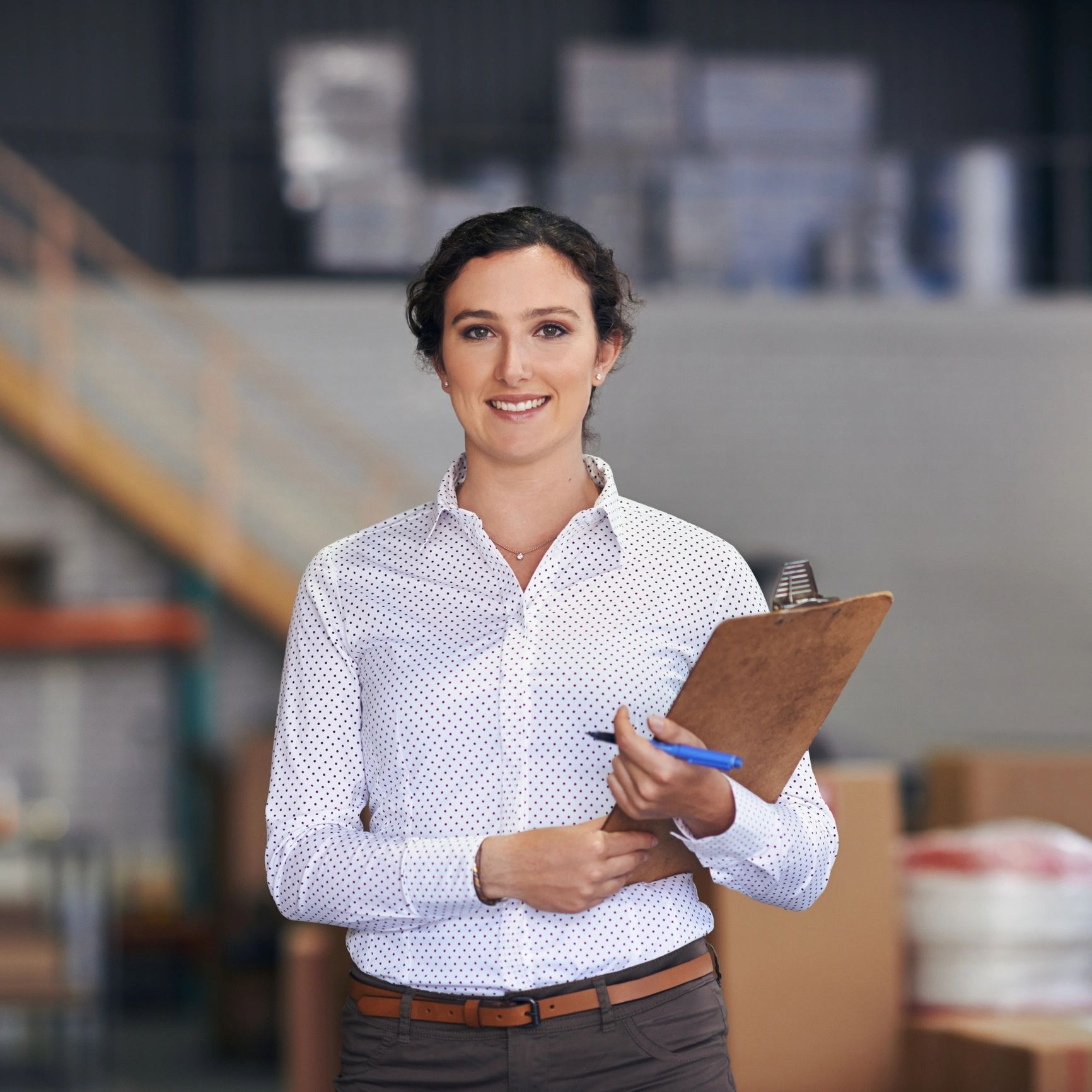 Small business owner with clipboard